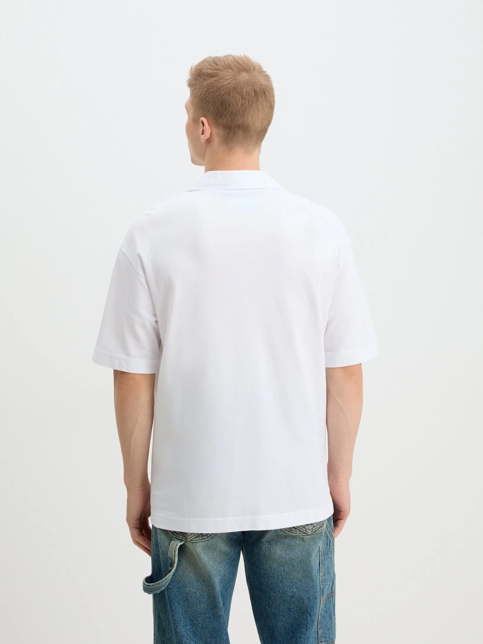 Versace Jeans Couture White Relaxed Polo Shirt – Effortless Minimalism -