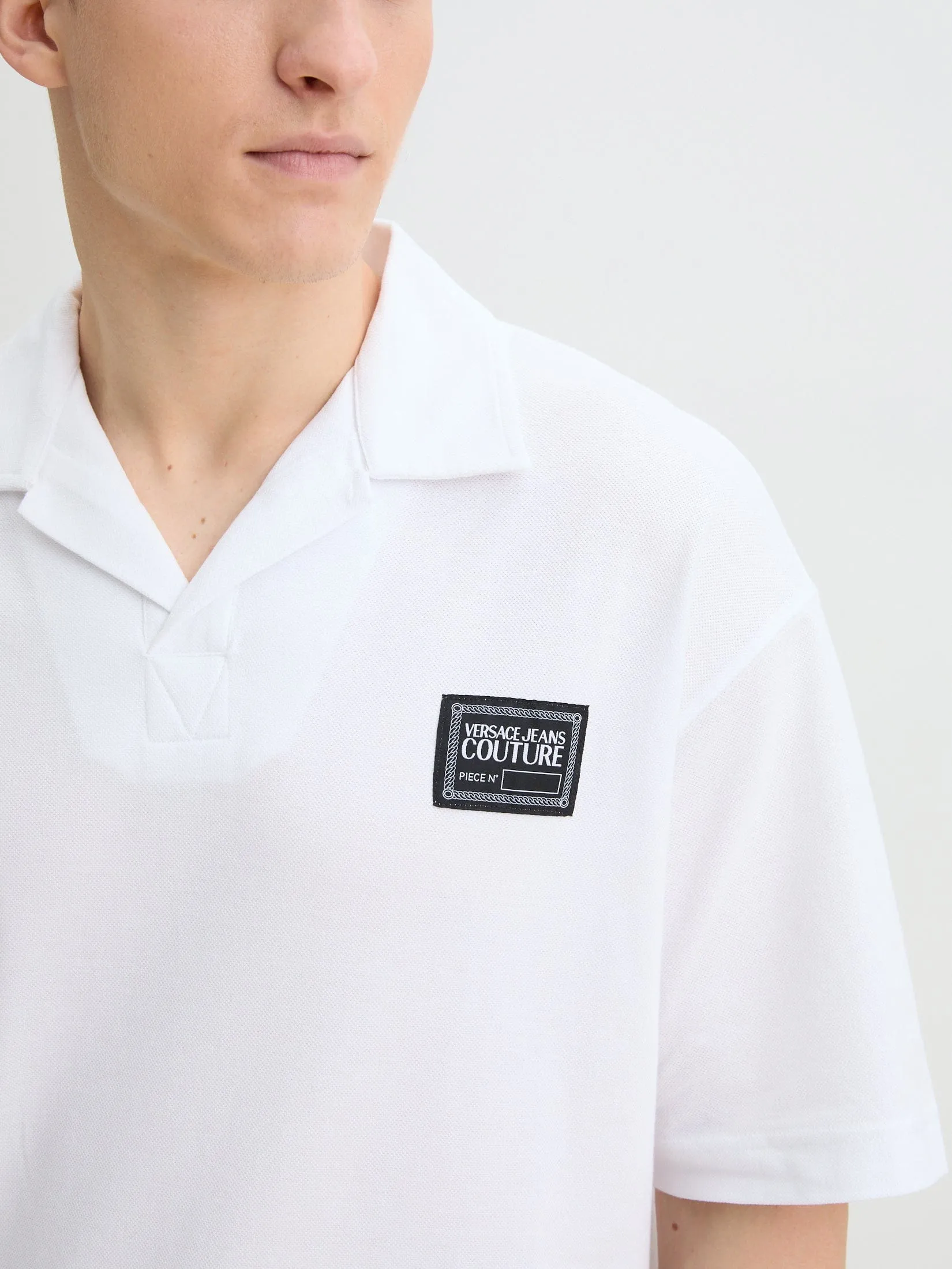 Versace Jeans Couture White Relaxed Polo Shirt – Effortless Minimalism -